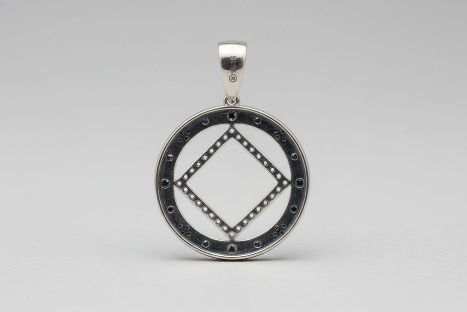Large NA Symbol Pendant w/clear cz stones in .925 sterling silver 34MM