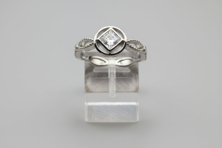 NA Ring Service Symbol with Cubic Zirconia Stone Center and cz accents around band .925